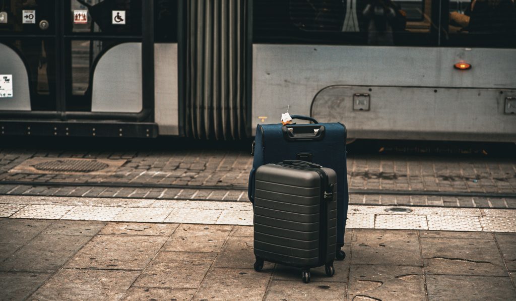Professional suitcase and bag repair service replacing luggage wheels